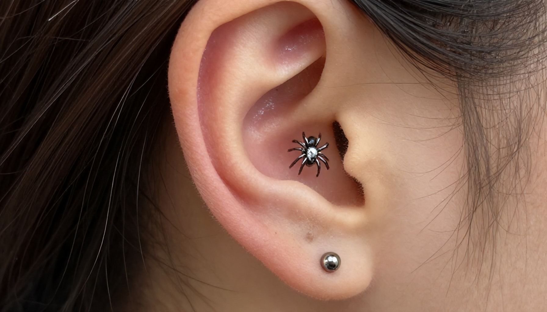 The Truth About Spider Bite Piercing: Is It Really Painless?*