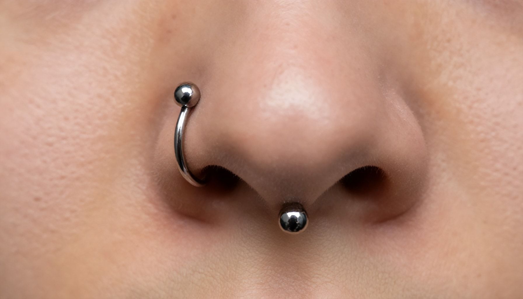 Enhance Your Look with a Stylish and Safe Septum Piercing 2 Why a Septum Piercing is a Low-Maintenance, High-Impact Accessory*